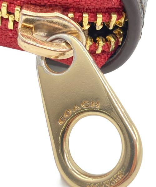 COACH（コーチ）COACH (コーチ) ラウンドファスナー財布 ブラウン×レッドの古着・服飾アイテム