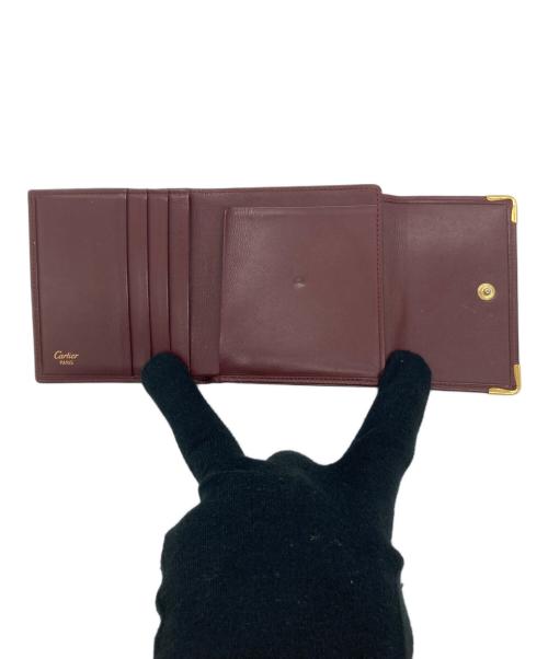 Cartier（カルティエ）Cartier (カルティエ) 3つ折り財布 ボルドーの古着・服飾アイテム