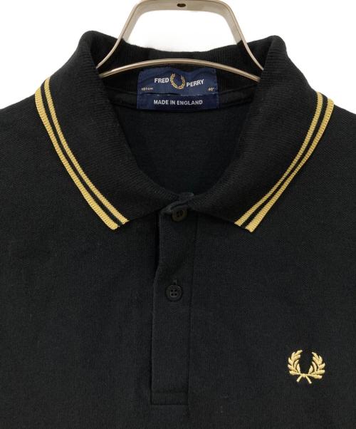 FRED PERRY（フレッドペリー）FRED PERRY (フレッドペリー) ポロシャツ ブラック×ゴールド サイズ:SIZE 40の古着・服飾アイテム