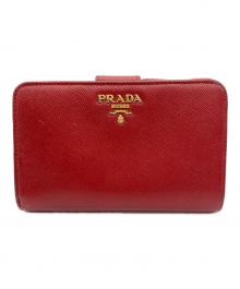 PRADA（プラダ）の古着「ラウンドファスナー財布」｜レッド
