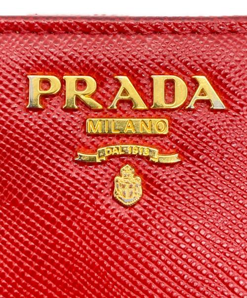 PRADA（プラダ）PRADA (プラダ) ラウンドファスナー財布 レッドの古着・服飾アイテム