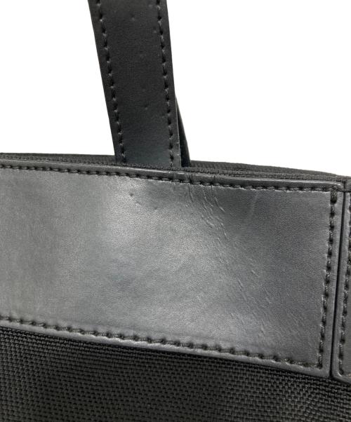 IACUCCI（イアクッチ）IACUCCI (イアクッチ) キャンバストートバッグ ブラックの古着・服飾アイテム
