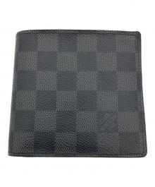 LOUIS VUITTON（ルイ ヴィトン）の古着「2つ折り財布/ダミエ・グラフィット・ポルトフォイユ・マルコ」｜ブラック