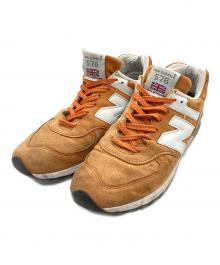 NEW BALANCE（ニューバランス）の古着「スニーカー」｜オレンジ