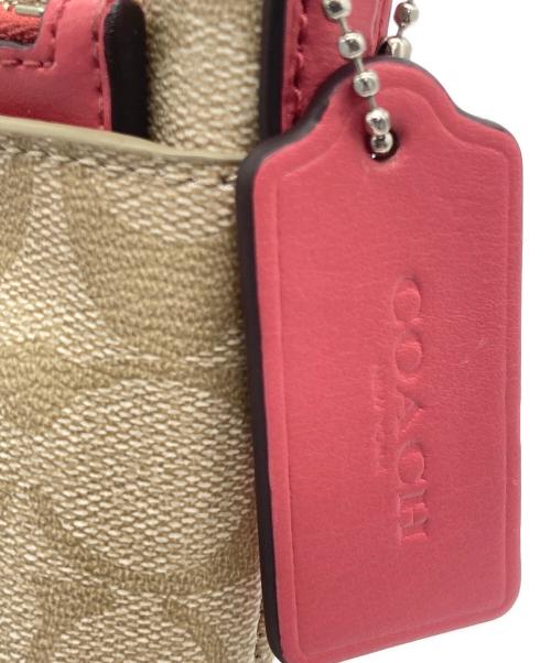 COACH（コーチ）COACH (コーチ) クロスボディショルダーバッグ ベージュ×ピンクの古着・服飾アイテム