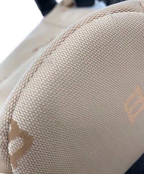 marimekko（マリメッコ）marimekko (マリメッコ) エッセンシャル バケット ロゴ ベージュ×ブラックの古着・服飾アイテム