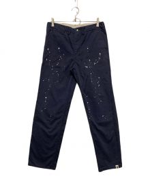 A BATHING APE（ア ベイシング エイプ）の古着「チノパン　ペイント加工」｜ネイビー