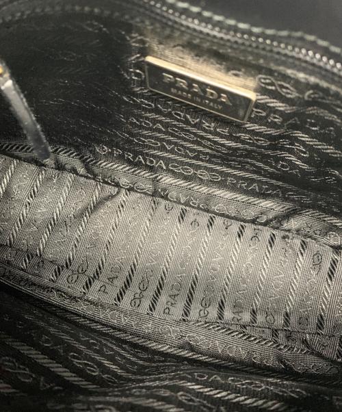 PRADA（プラダ）PRADA (プラダ) フラワーレザーハンドバッグ ブラックの古着・服飾アイテム