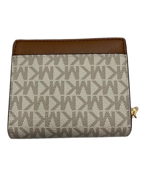 MICHAEL KORS（マイケル・コース）MICHAEL KORS (マイケル・コース) 2つ折り財布 ベージュ 未使用品の古着・服飾アイテム