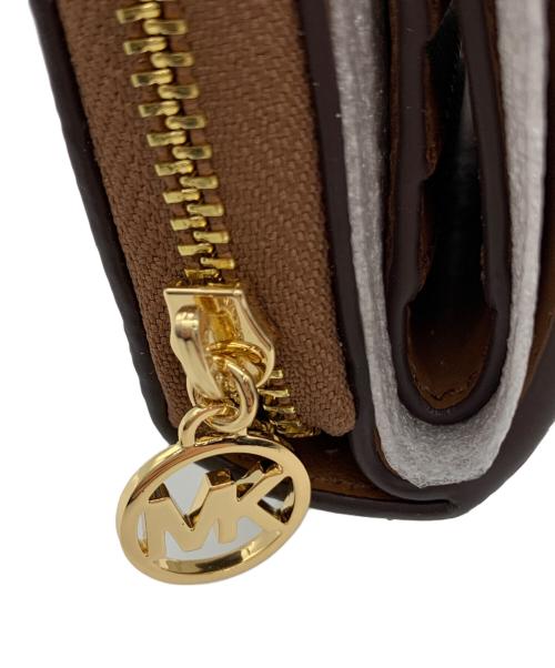 MICHAEL KORS（マイケル・コース）MICHAEL KORS (マイケル・コース) 2つ折り財布 ベージュ 未使用品の古着・服飾アイテム