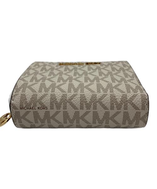 MICHAEL KORS（マイケル・コース）MICHAEL KORS (マイケル・コース) 2つ折り財布 ベージュ 未使用品の古着・服飾アイテム