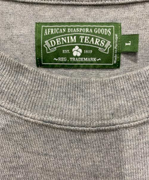 Denim Tears（デニムティアーズ）Denim Tears (デニムティアーズ) ロングスリーブTシャツ ライトグレー×ホワイト サイズ:Lサイズの古着・服飾アイテム