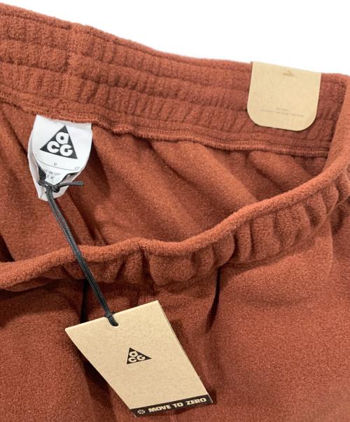 NIKE ACG（ナイキエーシージー）NIKE ACG (ナイキエーシージー)  POLARTEC 'WOLF TREE' フリースパンツ ブラウン サイズ:Sサイズ 未使用品の古着・服飾アイテム