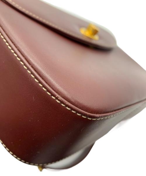 Cartier（カルティエ）Cartier (カルティエ) マストライン　ターンロック バーガンディーの古着・服飾アイテム