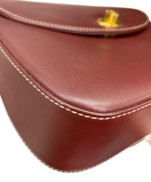 Cartier（カルティエ）Cartier (カルティエ) マストライン　ターンロック バーガンディーの古着・服飾アイテム