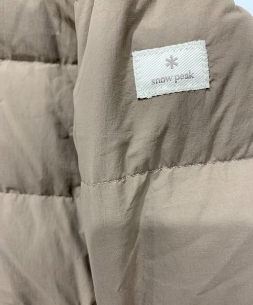 Snow peak（スノーピーク）Snow peak (スノーピーク) スタンドネックライトウェイトダウンジャケット グレージュ サイズ:Lサイズの古着・服飾アイテム