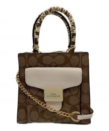 COACH（コーチ）の古着「MINI PEPPER CROSSBODY」｜ブラウン×アイボリー