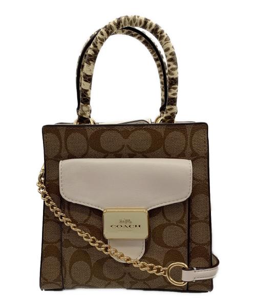 COACH（コーチ）COACH (コーチ) MINI PEPPER CROSSBODY ブラウン×アイボリーの古着・服飾アイテム