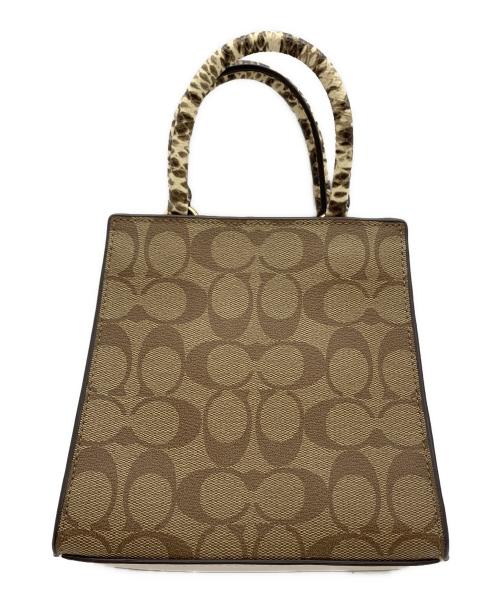 COACH（コーチ）COACH (コーチ) MINI PEPPER CROSSBODY ブラウン×アイボリーの古着・服飾アイテム