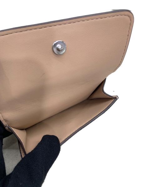 COACH（コーチ）COACH (コーチ) 3つ折り財布 ピンクの古着・服飾アイテム