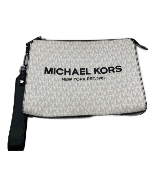MICHAEL KORS（マイケルコース）MICHAEL KORS (マイケルコース) クラッチバッグ ホワイト×ブラックの古着・服飾アイテム
