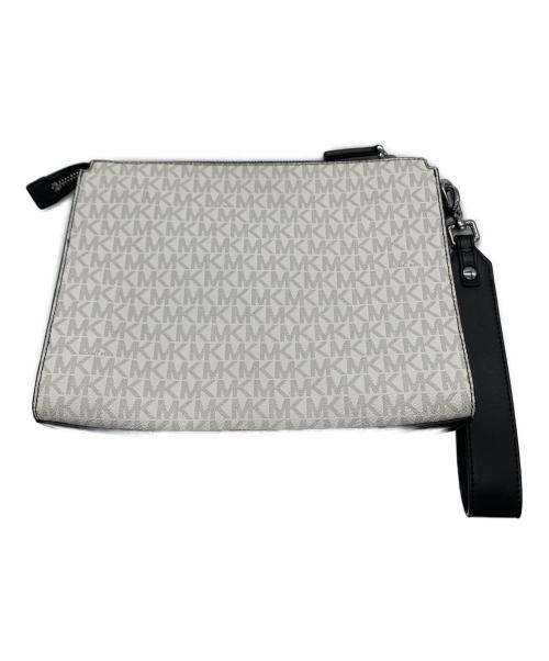 MICHAEL KORS（マイケルコース）MICHAEL KORS (マイケルコース) クラッチバッグ ホワイト×ブラックの古着・服飾アイテム
