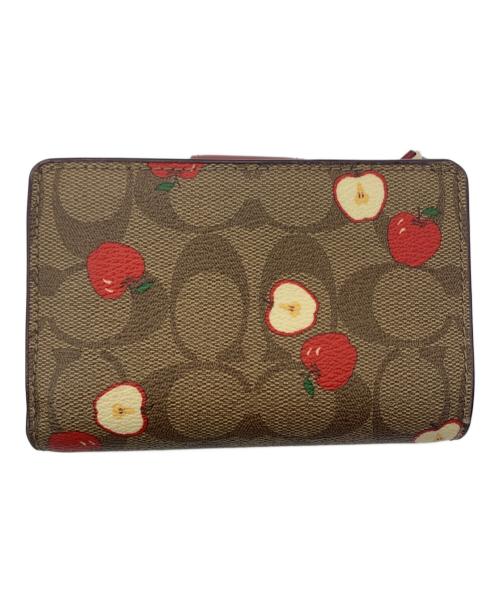 COACH（コーチ）COACH (コーチ) シグネチャー　2つ折り財布 ブラウン×レッドの古着・服飾アイテム