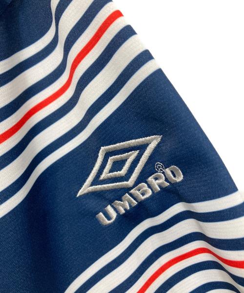 ATMOS（アトモス）ATMOS (アトモス) UMBRO (アンブロ) ゲームシャツ ブルー×レッド サイズ:SIZE Mの古着・服飾アイテム