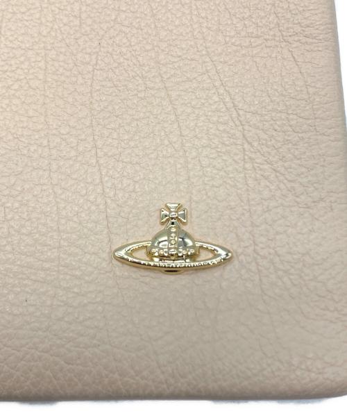 Vivienne Westwood（ヴィヴィアンウエストウッド）Vivienne Westwood (ヴィヴィアンウエストウッド) クラッチバッグ ベージュの古着・服飾アイテム