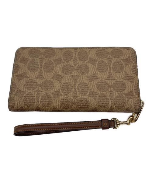 COACH（コーチ）COACH (コーチ) PEANUTS　キャンバス・シグネチャー ベージュの古着・服飾アイテム
