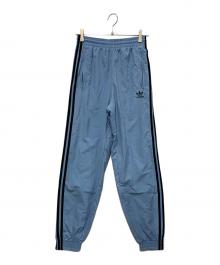 adidas（アディダス）の古着「ウーブンファイヤーバードトラックパンツ」｜ブルー×ブラック