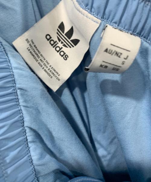 adidas（アディダス）adidas (アディダス) ウーブンファイヤーバードトラックパンツ ブルー×ブラック サイズ:SIZE Sの古着・服飾アイテム