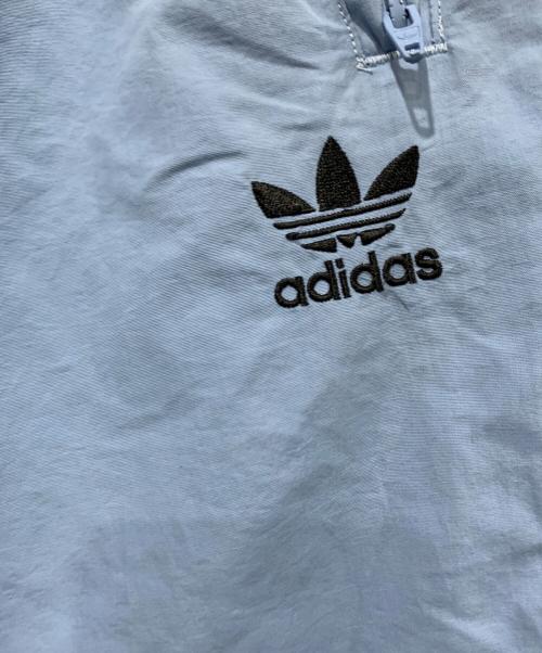 adidas（アディダス）adidas (アディダス) ウーブンファイヤーバードトラックパンツ ブルー×ブラック サイズ:SIZE Sの古着・服飾アイテム