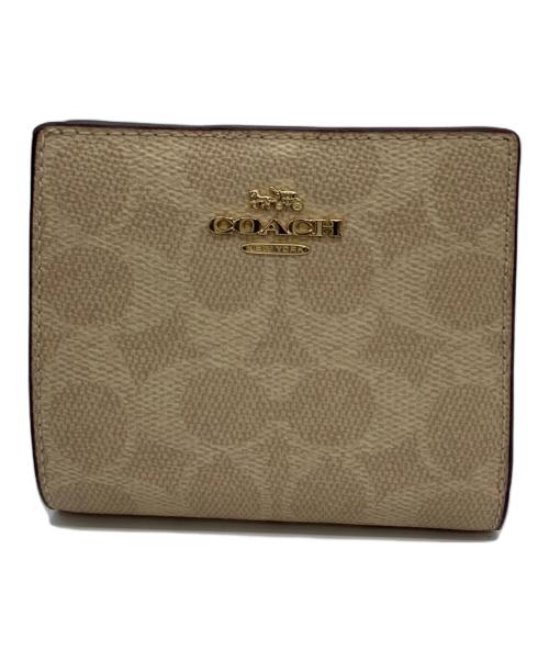 COACH（コーチ）COACH (コーチ) 2つ折り財布 ベージュの古着・服飾アイテム