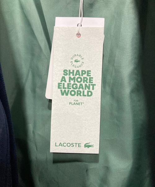 LACOSTE（ラコステ）LACOSTE (ラコステ) 鹿の子地ダウンジャケット ネイビー サイズ:SIZE 48の古着・服飾アイテム