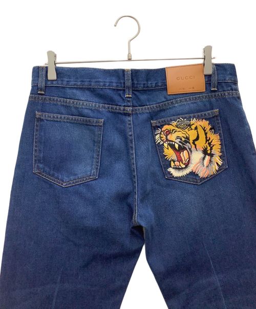 GUCCI（グッチ）GUCCI (グッチ) デニムパンツ タイガーフラワー刺繍 ネイビー サイズ:SIZE 76cm (W30)の古着・服飾アイテム