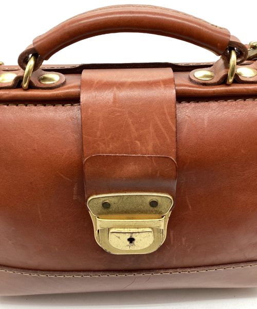 Herz（ヘルツ）Herz (ヘルツ) 2way口枠ミニショルダー ブラウンの古着・服飾アイテム