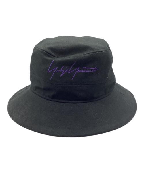 YOHJI YAMAMOTO（ヨウジヤマモト）YOHJI YAMAMOTO (ヨウジヤマモト) New Era (ニューエラ) DUCK COTTON ADVENTURE DOG EAR YY LEATHER PATCH ブラックの古着・服飾アイテム