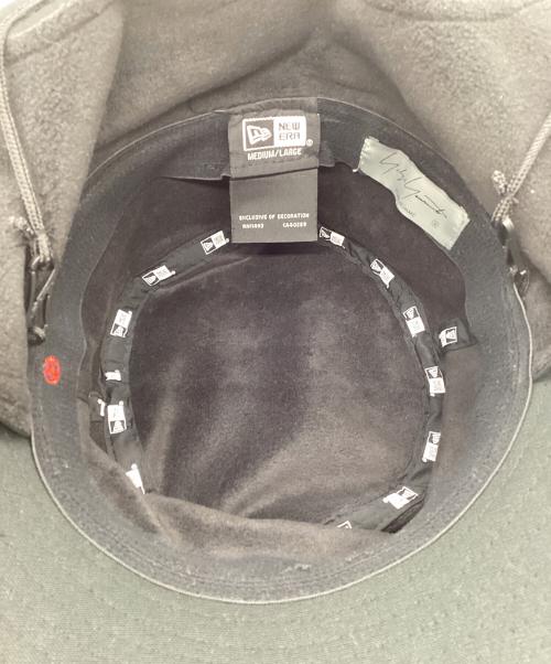 YOHJI YAMAMOTO（ヨウジヤマモト）YOHJI YAMAMOTO (ヨウジヤマモト) New Era (ニューエラ) DUCK COTTON ADVENTURE DOG EAR YY LEATHER PATCH ブラックの古着・服飾アイテム