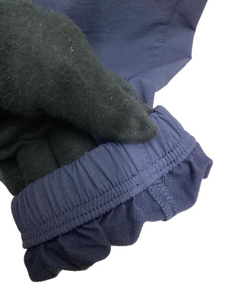 Champion（チャンピオン）Champion (チャンピオン) グラフィックロゴプリント ロングパンツ アクションスタイル 24AW ネイビー サイズ:SIZE Mの古着・服飾アイテム