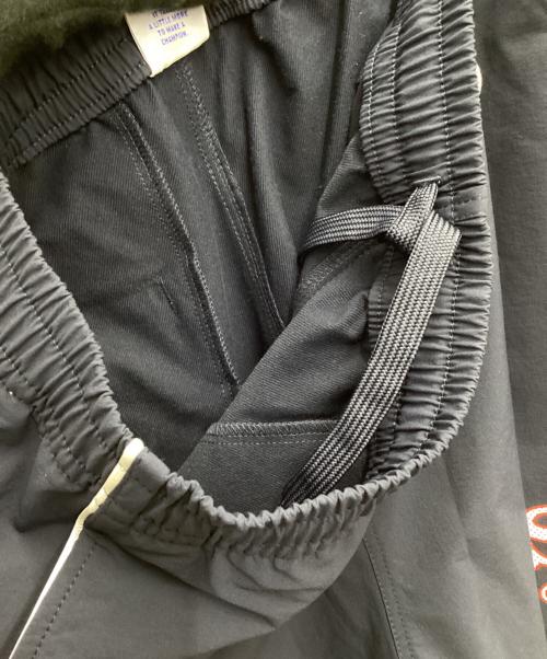 Champion（チャンピオン）Champion (チャンピオン) グラフィックロゴプリント ロングパンツ アクションスタイル 24AW ネイビー サイズ:SIZE Mの古着・服飾アイテム