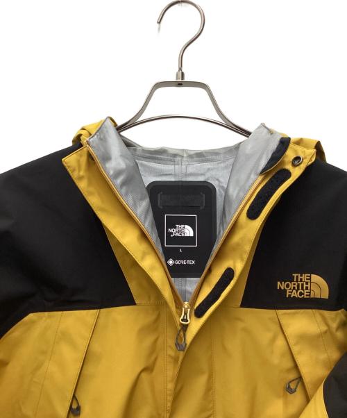 THE NORTH FACE（ザ ノース フェイス）THE NORTH FACE (ザ ノース フェイス) マウンテンラウンダージャケット ブラック×ターメリック サイズ:SIZE L 未使用品の古着・服飾アイテム