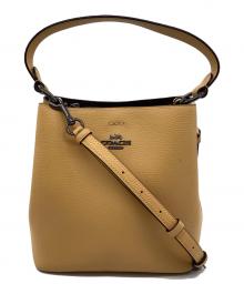 COACH（コーチ）の古着「バケットショルダーバッグ」｜イエロー
