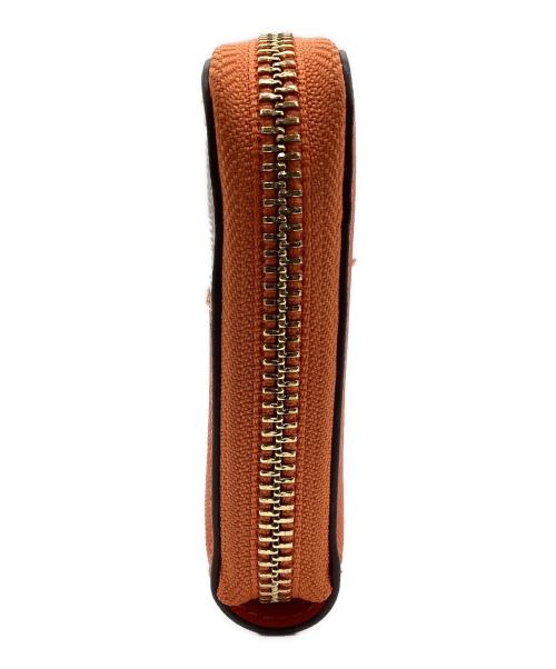 TORY BURCH（トリーバーチ）TORY BURCH (トリーバーチ) 長財布 オレンジ×ベージュの古着・服飾アイテム