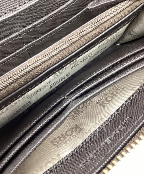 MICHAEL KORS（マイケル・コース）MICHAEL KORS (マイケル・コース) ラウンドファスナー財布 ブラウンの古着・服飾アイテム