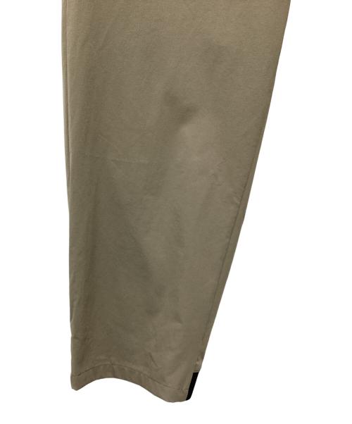 THE NORTH FACE（ザ ノース フェイス）THE NORTH FACE (ザ ノース フェイス) フレキシブルロングパンツ ベージュ サイズ:SIZE M 未使用品の古着・服飾アイテム