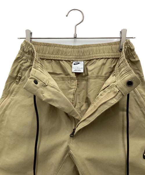 NIKE（ナイキ）NIKE (ナイキ) ウーブンパンツ ナイロンパンツ ベージュ サイズ:SIZE Sの古着・服飾アイテム