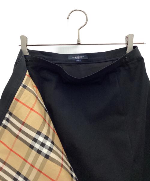 BURBERRY LONDON（バーバリーロンドン）BURBERRY LONDON (バーバリーロンドン) ラップスカート ブラック サイズ:SIZE 38の古着・服飾アイテム