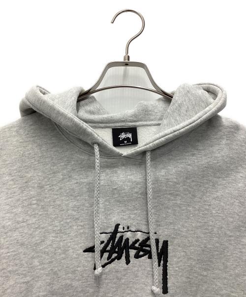 stussy（ステューシー）stussy (ステューシー) パーカー ライトグレー サイズ:SIZE Mの古着・服飾アイテム