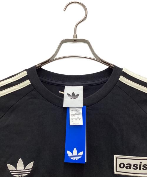 adidas Originals（アディダスオリジナル）adidas originals (アディダスオリジナル) oasis (オアシス) TOUR live'25 3-STRIPE長袖カットソー ブラック サイズ:SIZE XXLの古着・服飾アイテム